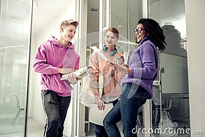 International students having conversation before science lecture Stock Photo