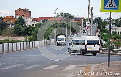 Internatsionalnaya Street and bridge through the river Krymza in the city of Syzran. City landscape. Samara region. Stock Photo