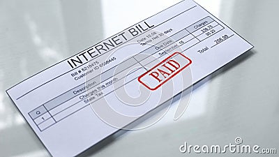 Internet bill paid, seal stamped on document, payment for services, tariff Stock Photo