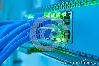 Internet connection. Network interfaces of the office router. Internet wires connect to the switch Stock Photo