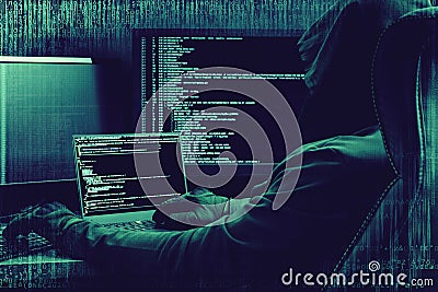 Internet crime concept. Hacker working on a code on dark digital background with digital interface around. Stock Photo