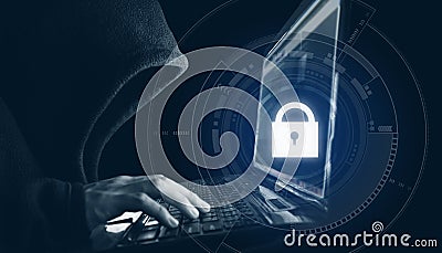 Internet network security system. Hacker in black hoodie using computer laptop Stock Photo