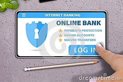 Hand with smart phone tapping the button log in on stone table background - internet online banking technology concept Stock Photo