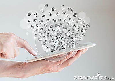 Internet of things (IoT) concept with hands holding tablet Stock Photo