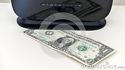 Internet usage fee discount, cheap internet, modem and 1 dollars next to it Stock Photo