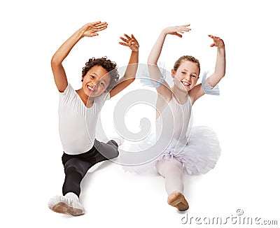 Interracial children dancing together Stock Photo