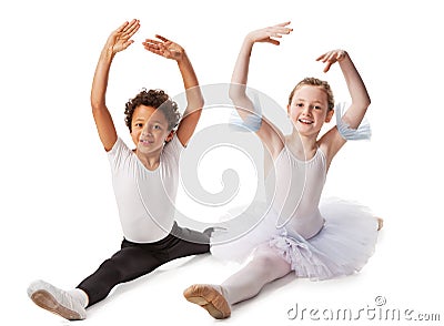 Interracial children dancing together Stock Photo