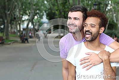 Interracial gay couple outdoor close up Stock Photo