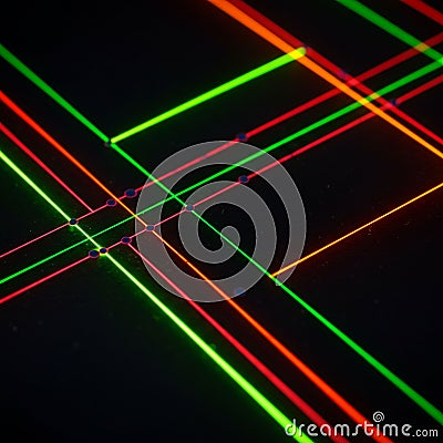 Intersecting neon lines in green and red on a dark background. The lines form a grid Stock Photo