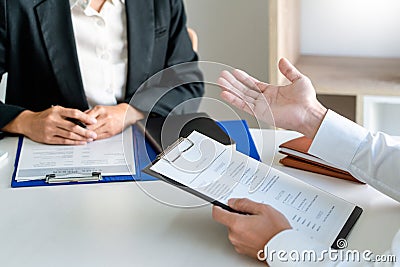Interview job concept, attractive candidate job seeker in suit answers employee for a business vacancy interviewing Stock Photo