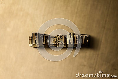 INTRANET - close-up of grungy vintage typeset word on metal backdrop Stock Photo