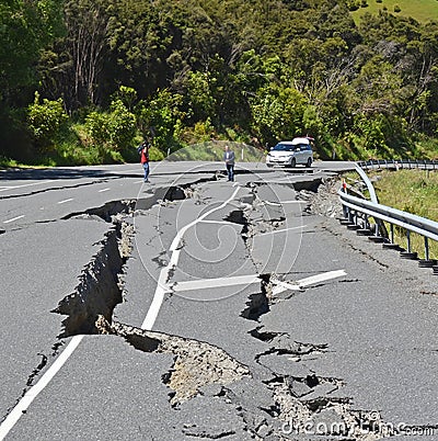 Intrepid TV Reporters Brave Earthquake damaged Road, New Zealand Editorial Stock Photo