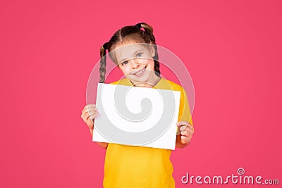 Intresting Offer. Little Girl Holding Blank Placard With Copy Space For Text Stock Photo