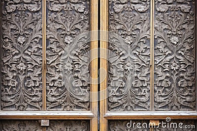intricate carvings on the door of a mausoleum Stock Photo
