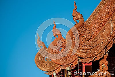 INTRICATE DETAIL OF GABLE END CRAVED IN THAI-LANNA STYLE. Stock Photo