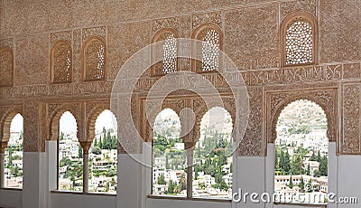 Intricate window detail inside the Alhambra palace Stock Photo