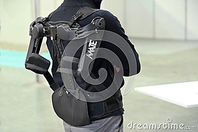 Introducing MATE, Comau Exoskeleton, an ergonomically designed wearable structure that increases work quality and efficiency Editorial Stock Photo