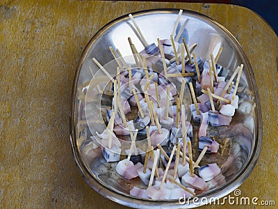 Inuit food, narwhale skin in a silver bowl, Stock Photo