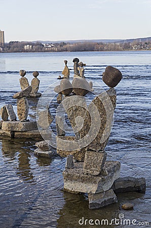 Inukshuks in the Ottawa River at Remics Rapids Stock Photo