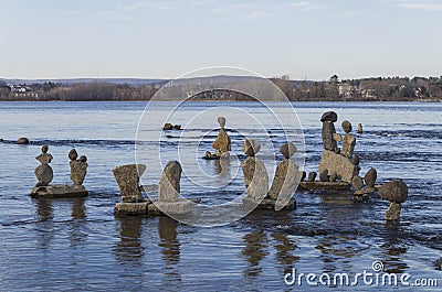 Inukshuks in the Ottawa River at Remics Rapids Stock Photo