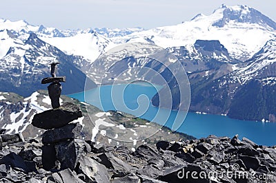 Inuksuk on top of Black Tusk mountain Stock Photo