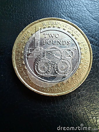 Invention, Industy, progress, steam works 2004 two pound coin, Audacious Antiques, Devon, UK Stock Photo