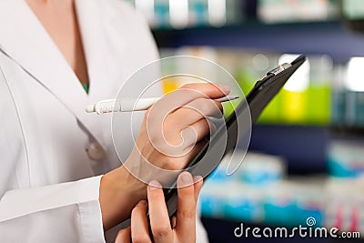 Inventory or order taking in pharmacy Stock Photo