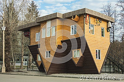 Inverted house Stock Photo