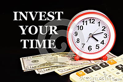 Invest your time. Text inscription on the background of a watch and cash. Stock Photo