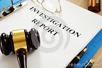Investigation report on a table. Stock Photo