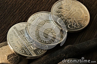 Investment coins. Austrian silver coin one fifty euro Vienna Philharmonic. Stock Photo