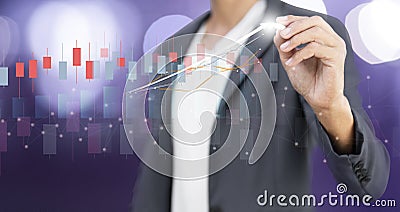Investment ,financial and sale marketing stock with hand of businessman writing graph analyzing Stock Photo
