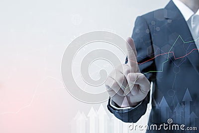 Investment Leadership and business innovation and technology concept : Hand of Businessman touching the investment graph network Stock Photo