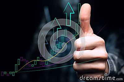 An investor with a phone shows a thumbs up, against the backdrop of an ascending graph with high volatility and moving averages. Stock Photo
