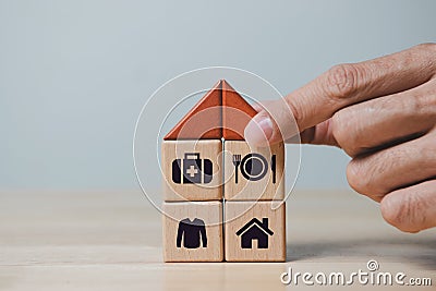 The investor `s hand placed a wooden cube with word Work on wooden table. concept work from home, Planning to buy property concept Stock Photo