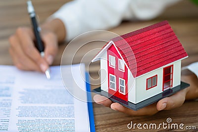 Investors signed a contract, Buying and selling real estate. Property investment and house mortgage financial concept Stock Photo