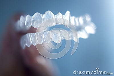 Invisible dental brackets Stock Photo