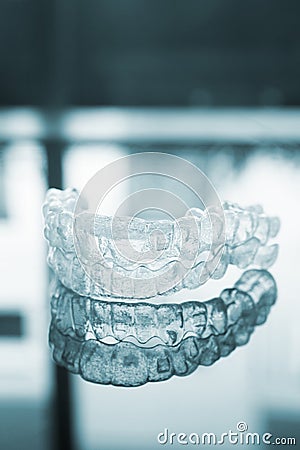 Invisible dental teeth brackets aligners braces retainers Stock Photo