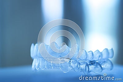 Invisible dental teeth brackets aligners braces retainers Stock Photo