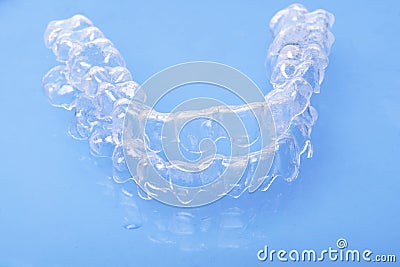 Invisible dental teeth brackets tooth aligners plastic braces dentistry retainers to straighten teeth Stock Photo