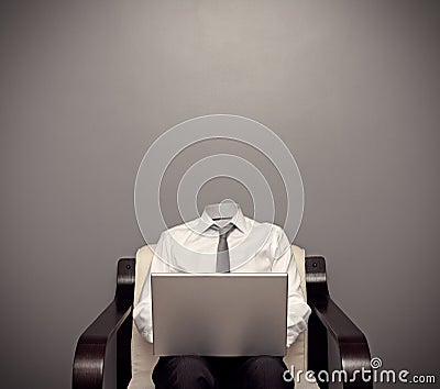 Invisible man working with laptop Stock Photo