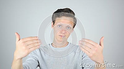 Invitation to Join, inviting to Come, Isolated Gesture by Young Man Stock Photo