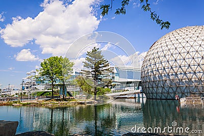 Inviting view of Toronto Ontario Place park grounds with stylish cinesphere standing in water Editorial Stock Photo