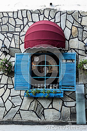 Vintage Restaurant Window With Colorful Shutters And Umbrella Editorial Stock Photo