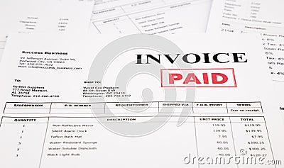 Invoice and bills with paid stamp Stock Photo