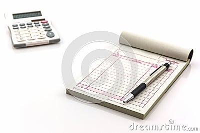 Invoice book which open blank page with pen and calculator. Stock Photo