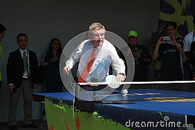 Ioc president Thomas Bach playing Table Tennis Editorial Stock Photo