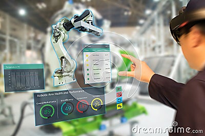 Iot industry 4.0 concept,industrial engineerblurred using smart glasses with augmented mixed with virtual reality technology to Stock Photo