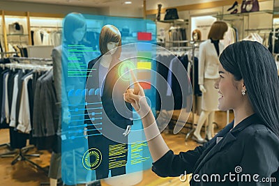 Iot smart retail futuristic technology concept, happy girl try to use smart display with virtual or augmented reality in the shop Stock Photo