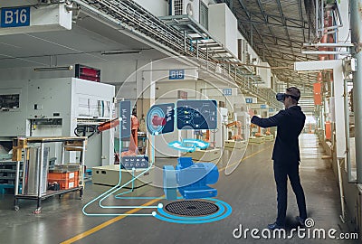 Iot smart technology futuristic in industry 4.0 concept, engineer use augmented mixed virtual reality to education and training, r Stock Photo